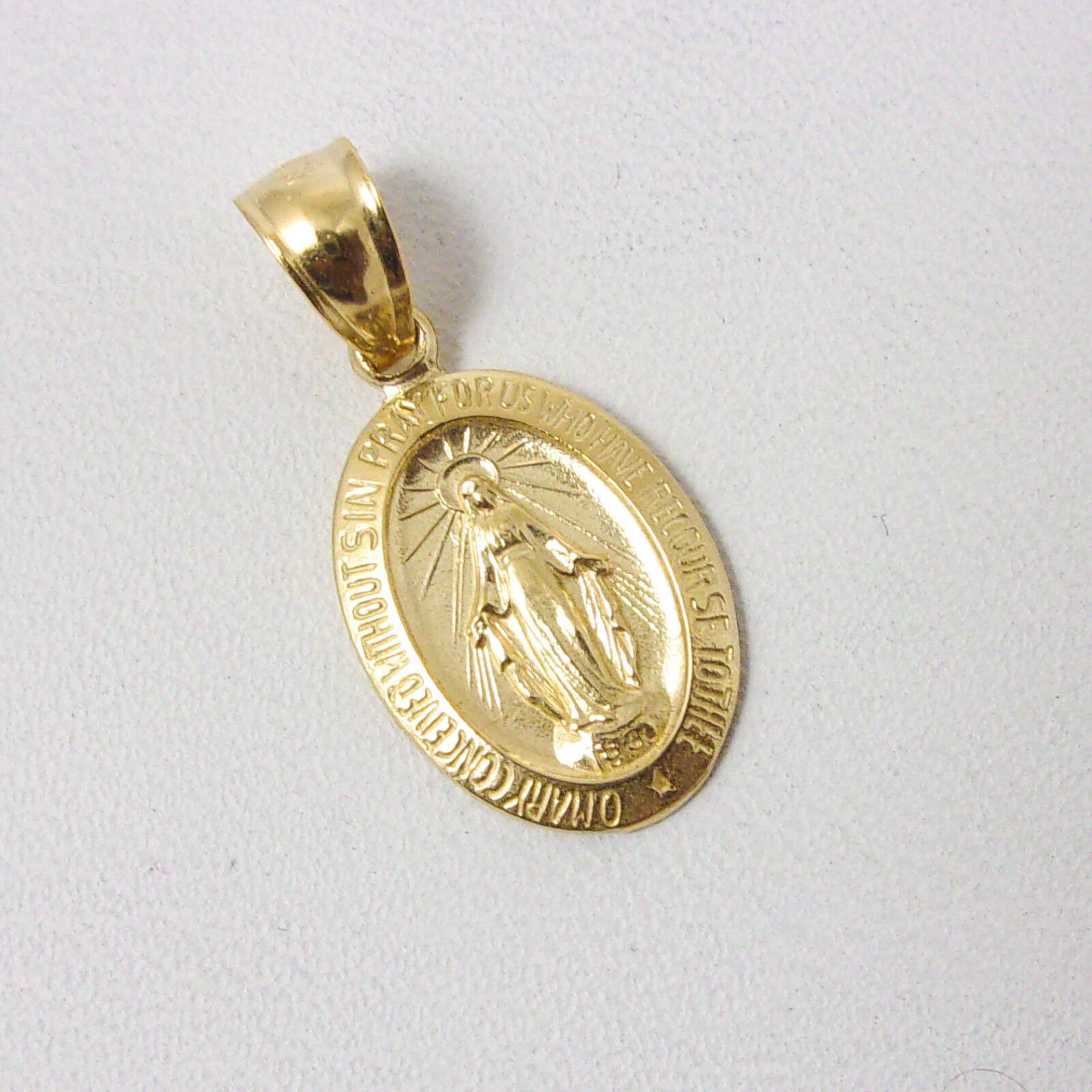 virgin mary gold medallion